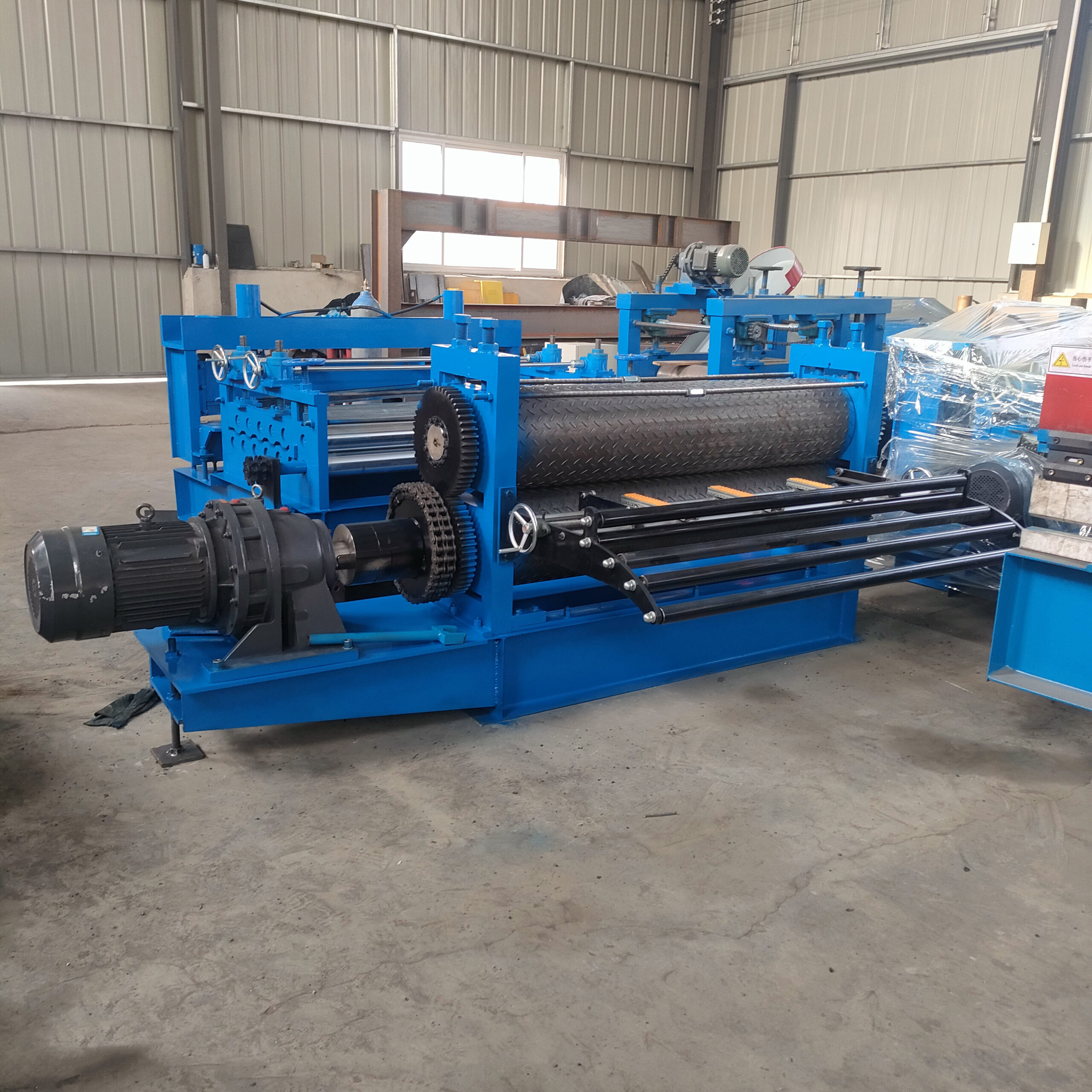 Metal embossing machine